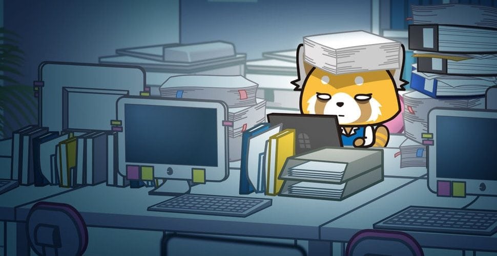 Retsuko working at her computer during the evening, looking burnt out and surrounded by piles of books and paper